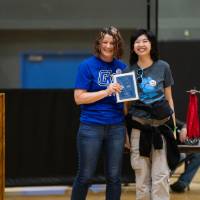 RMSC Director presenting participant with an award